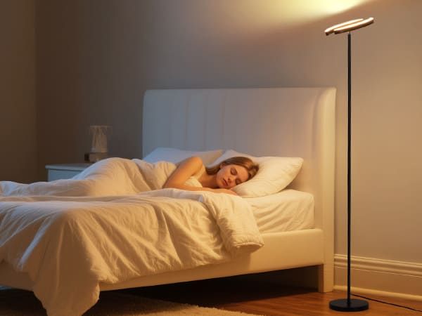 A modern living room with layered lighting, showing how floor lamps, pendant lights, and table lamps combine to create a warm, inviting atmosphere.