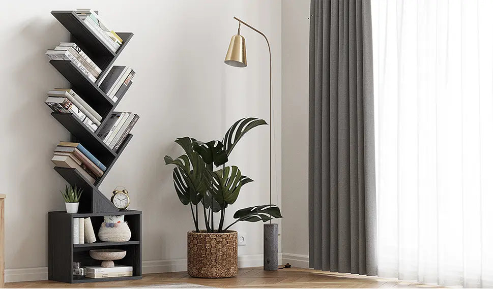 A wooden tree-design bookshelf by Sunmory, featuring two lower storage cabinets, serving as both a functional organizer and a decorative element in a living room.