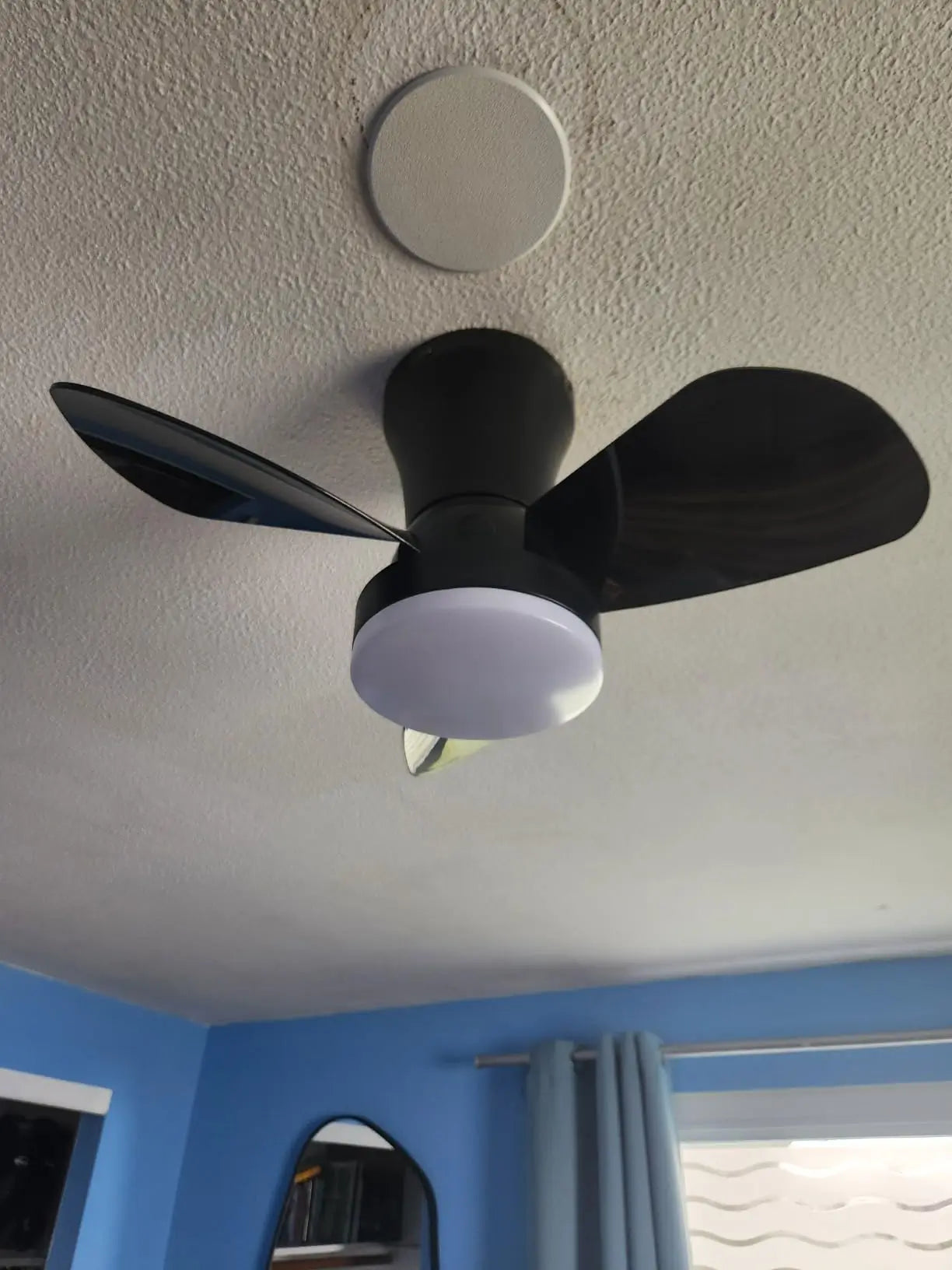 ceiling fan with an energy-efficient LED light, remote controlled, offering customizable brightness and fan speed for ultimate comfort and convenience.
