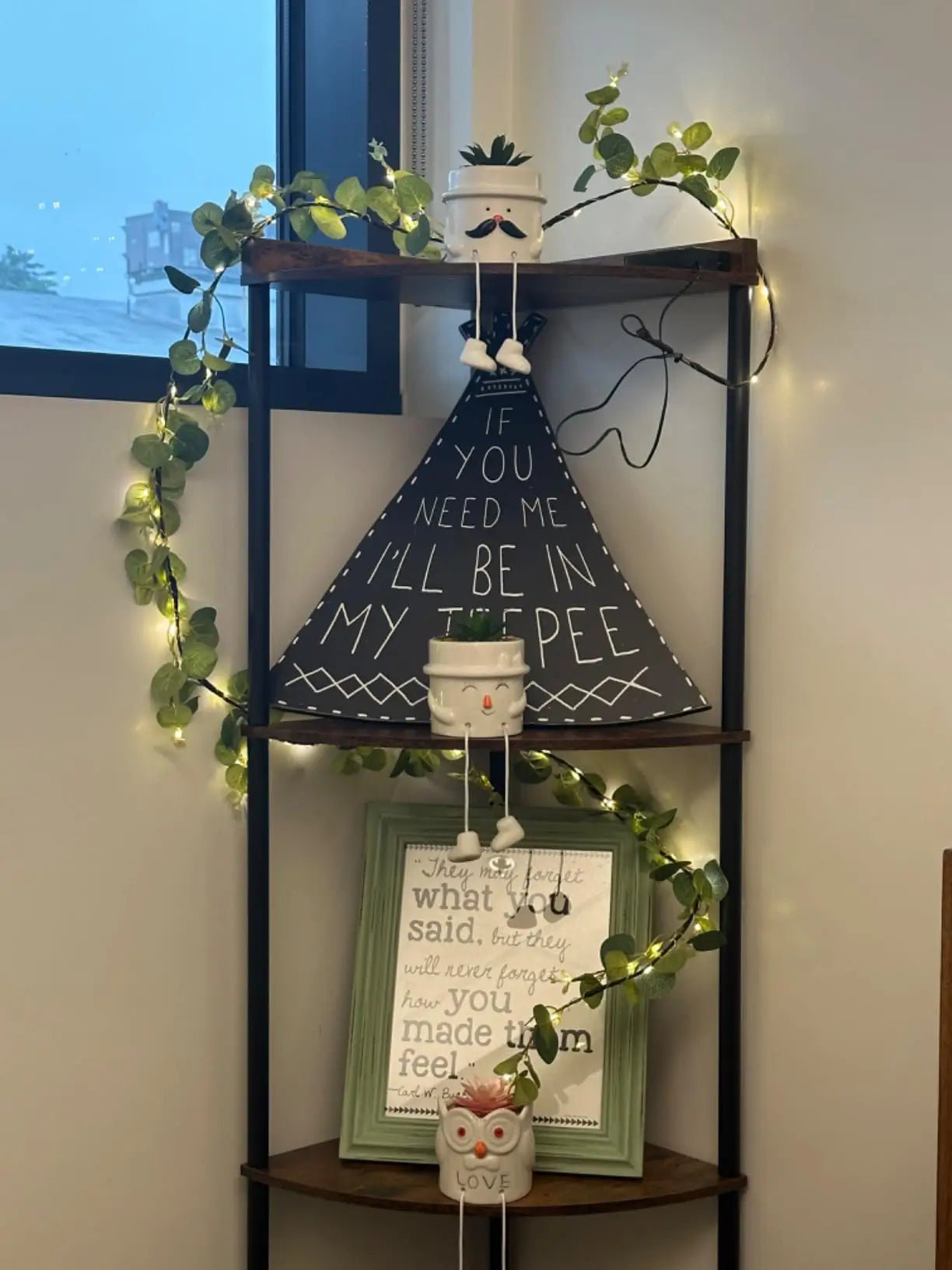 A modern corner shelf stand with multiple open tiers, perfect for organizing and displaying decorative items in a living room, maximizing vertical space.