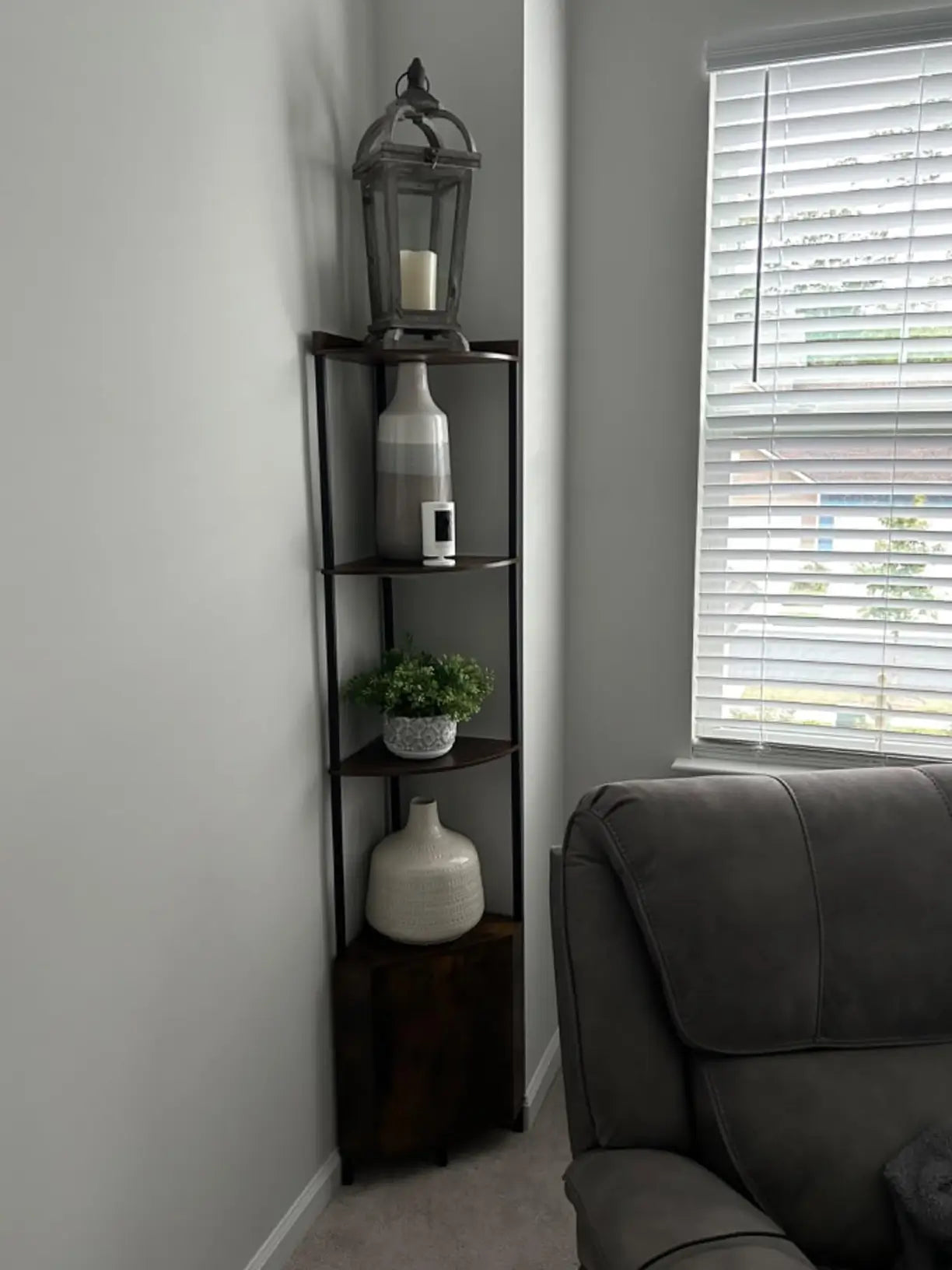 A rustic-style wooden corner cabinet shelf with multiple tiers, ideal for optimizing unused corner space and adding warmth to a farmhouse or traditional interior.