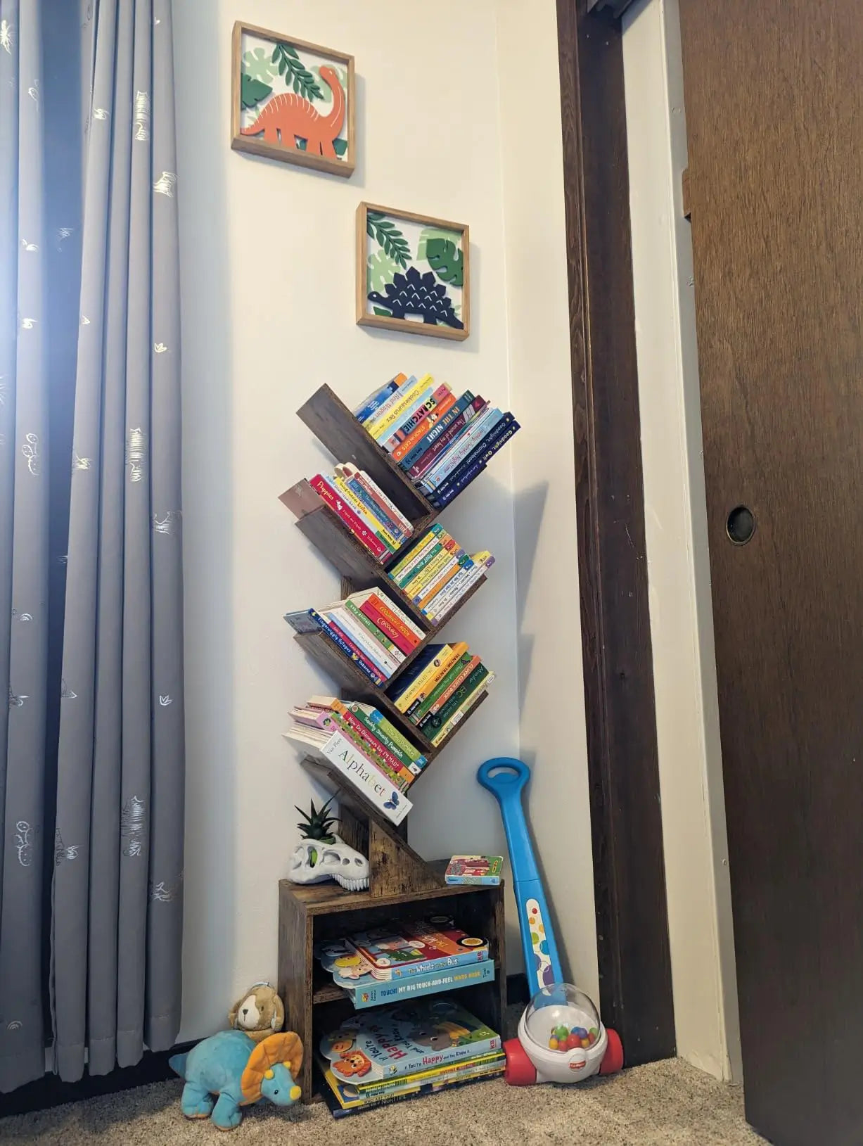 A unique tree bookshelf designed with playful, irregular shelves, perfect for a kids' room or a creative reading nook, adding character and storage.